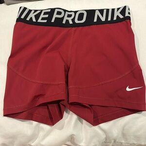 Red Nike Pro training shorts